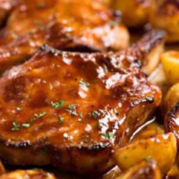 Juicy Oven Baked Pork Chops with Potatoes